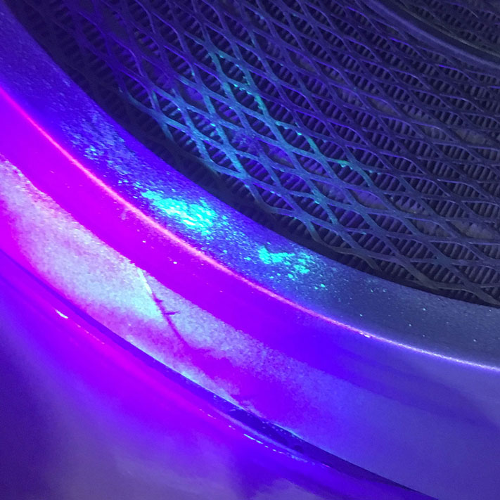 dust-collector-service-dye-test Close-up of a dust collector filter undergoing a dye test for leakage