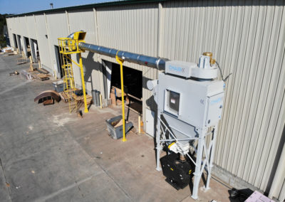 Industrial dust collector installation at pre-fabricated homes manufacturer