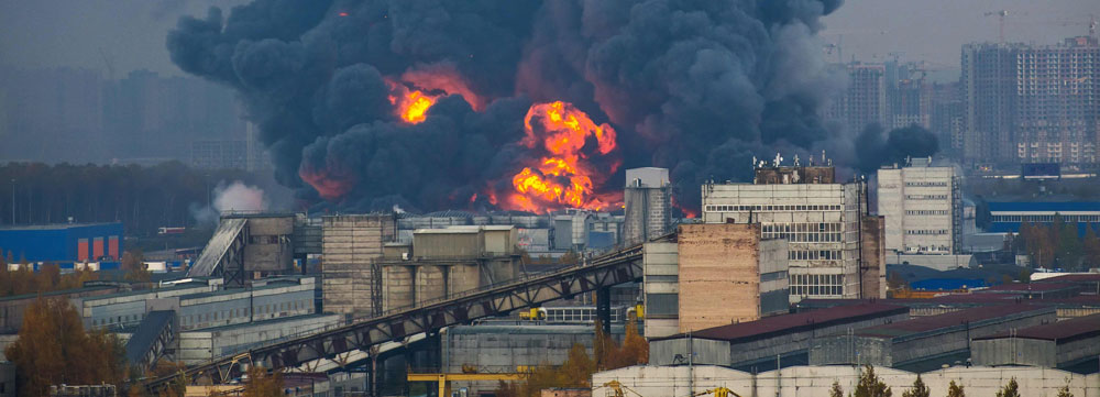 Photo of a factory fire that could have been prevented with proper fire and explosion control.