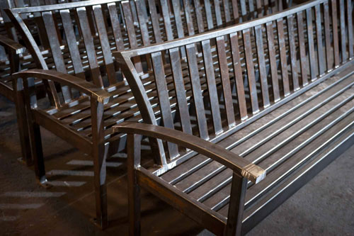 Heavy duty sandblasting was necessary in the production of these benches.