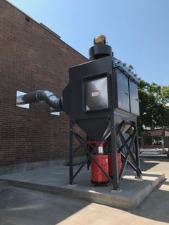 CMAXX dust collector protects students in high school woodworking program.