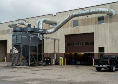 CMAXX dust collector installed and ducted for filtration of robot welding cells