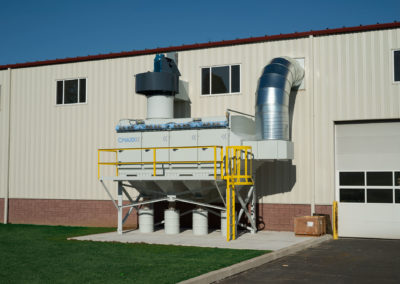 Outdoor CMAXX dust collector installation for robotic weld cell filtration
