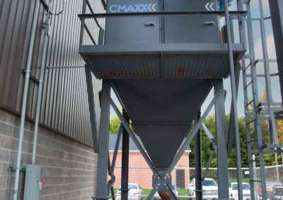 Outside installation of a CMAXX dust collector on fumes from robot weld cells