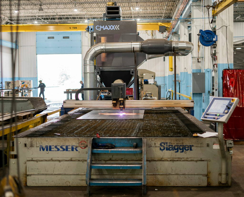 Plasma cutting machines with zoned downdraft tables like this one offer strategic dust control