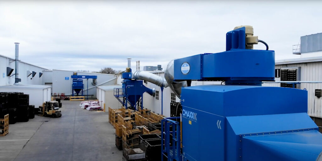 Outdoor installation of a CMAXX dust and fume collector at Excel Industries