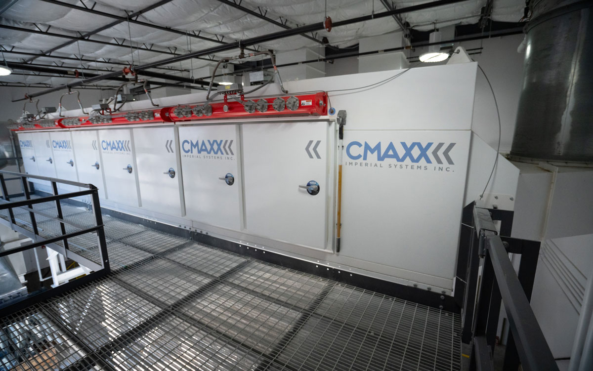 CMAXX dust and fume collection system installation at an automotive outfitter shop